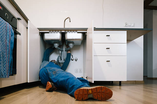 Professional Emergency Plumber technician working in Centerport, PA